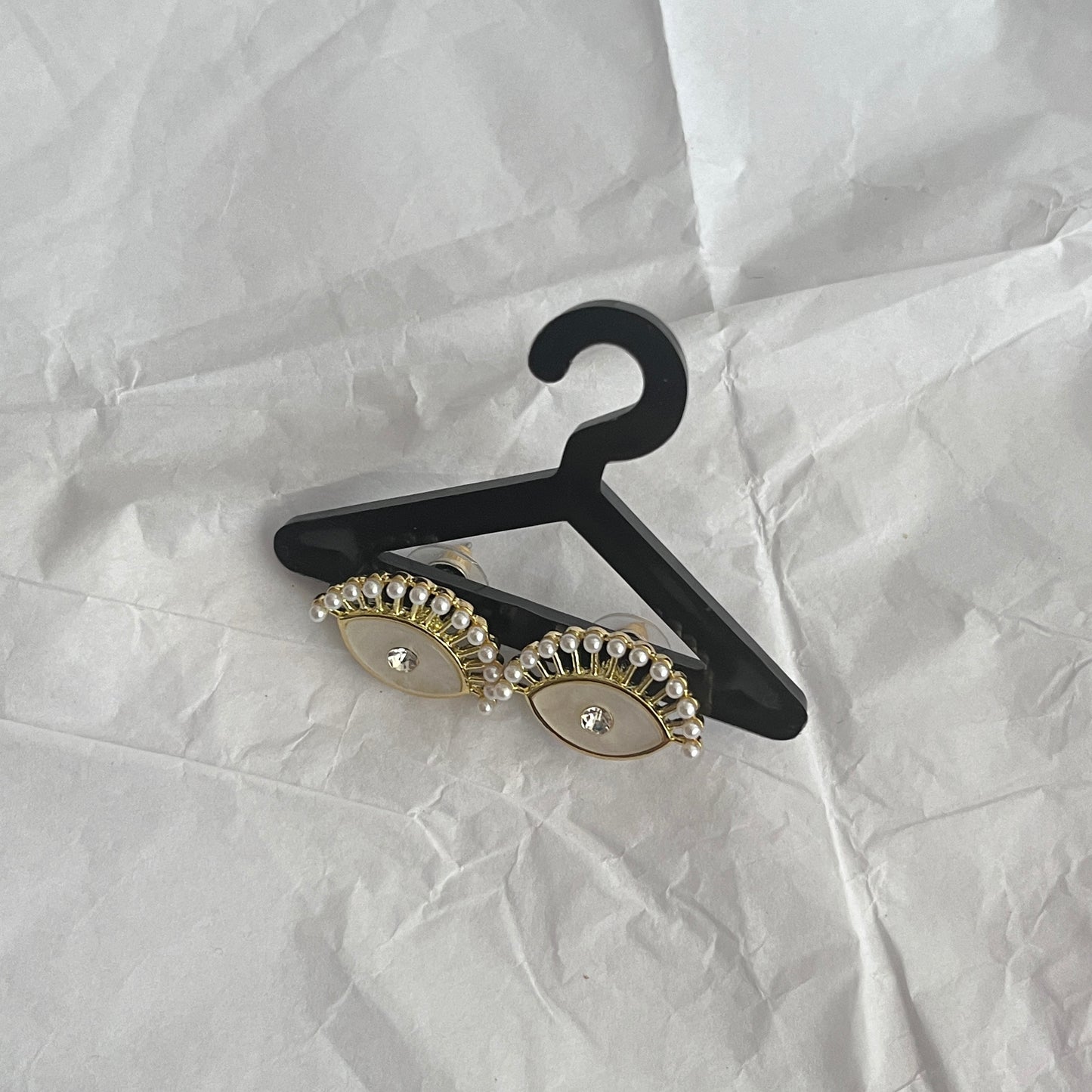 Aretes ojos