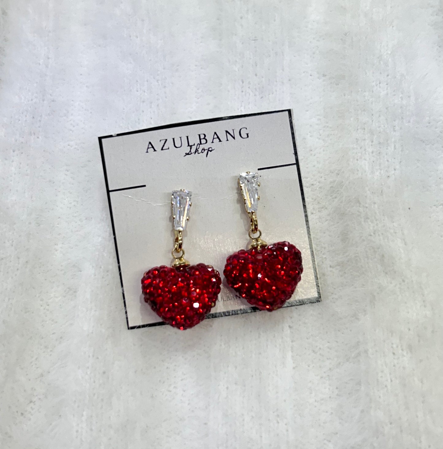 Aretes corazones brillos