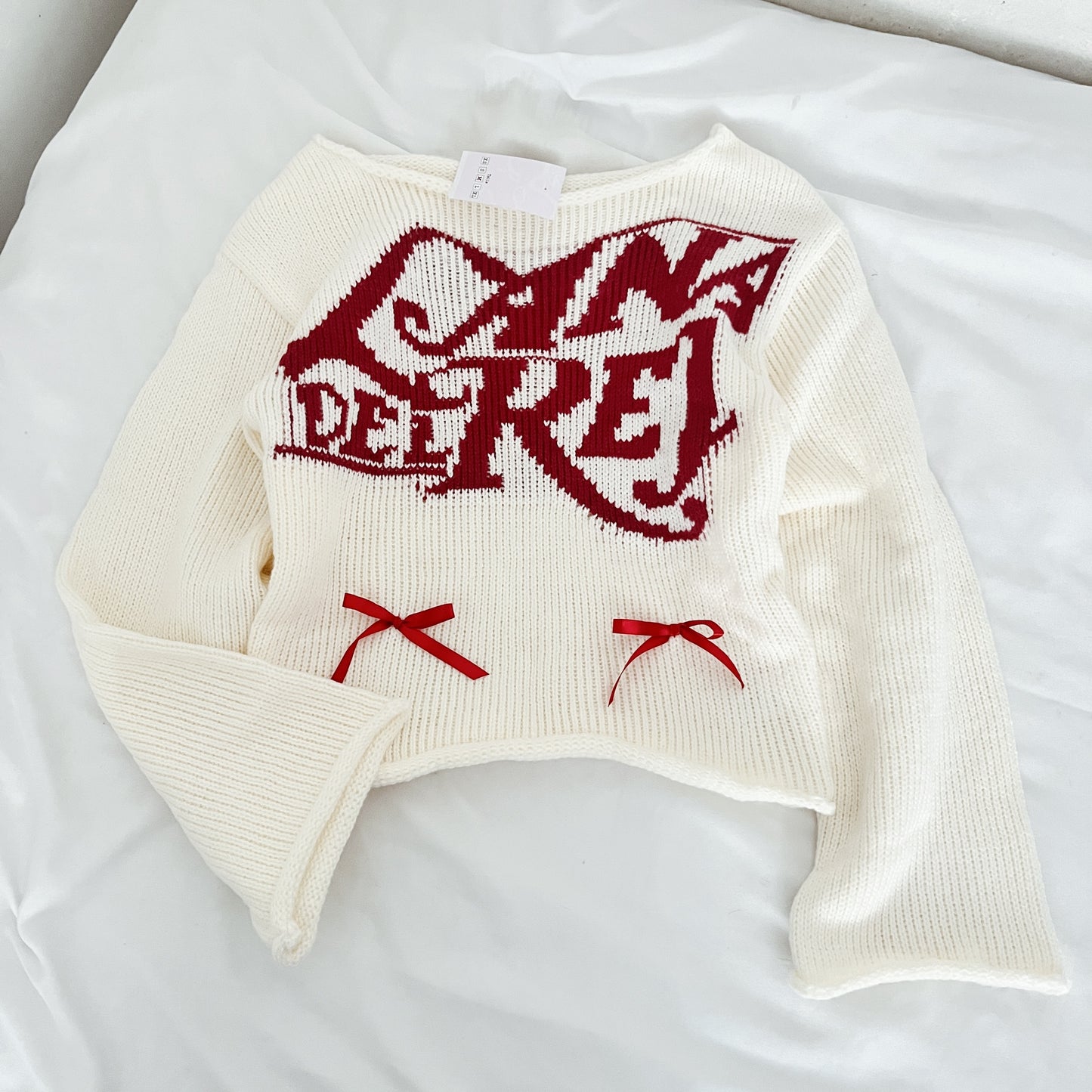 Suéter tejido Lana del Rey