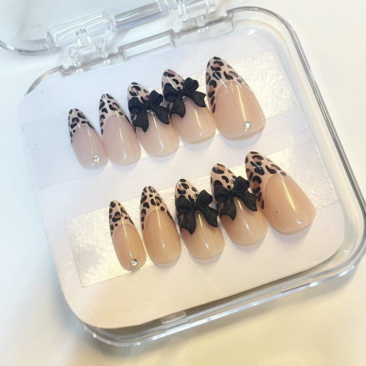 Uñas moño leopardo