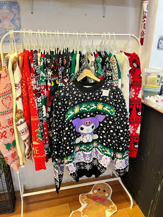 Suéter navideño kuromi con verde