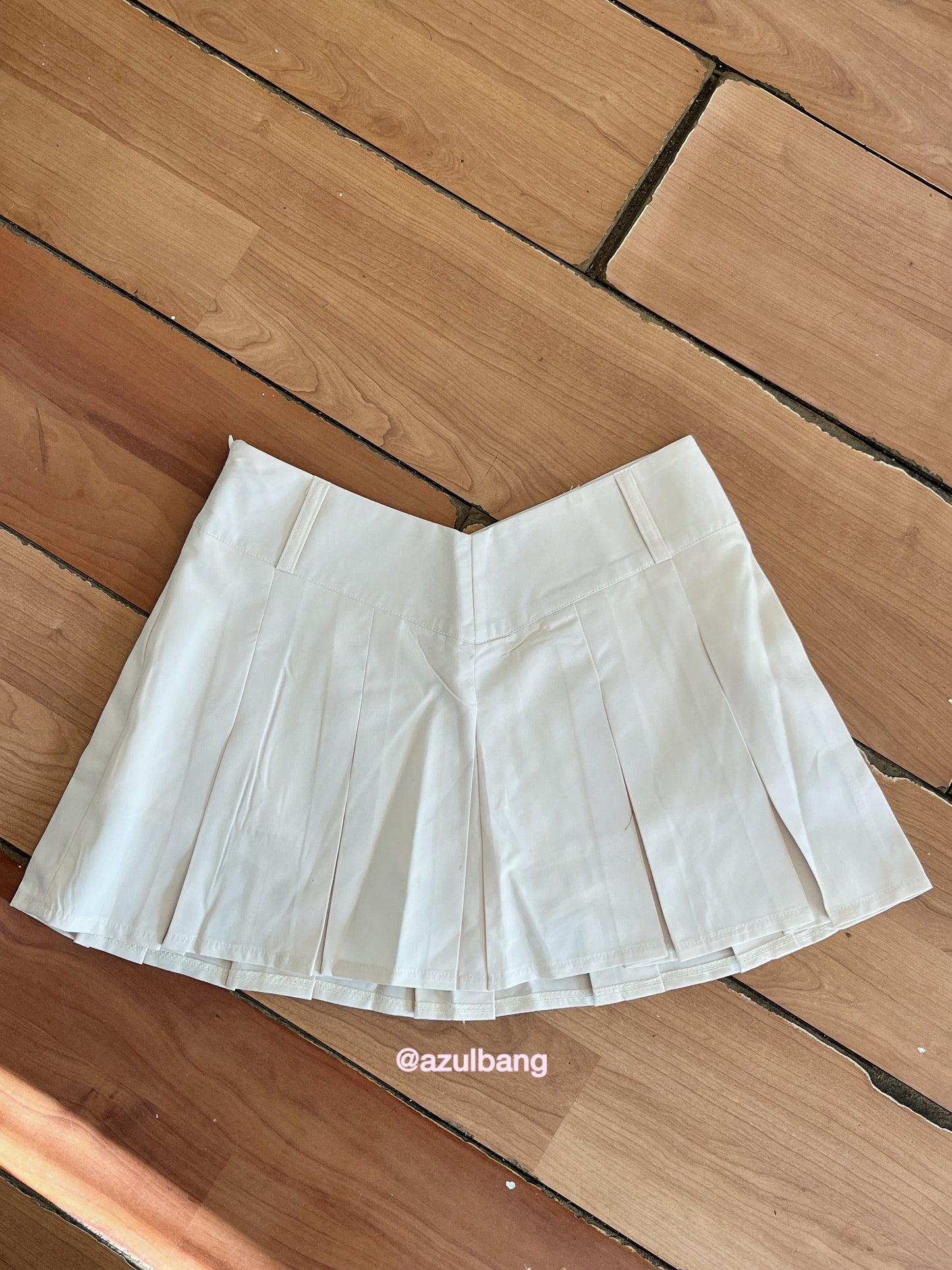 Falda tableada beige