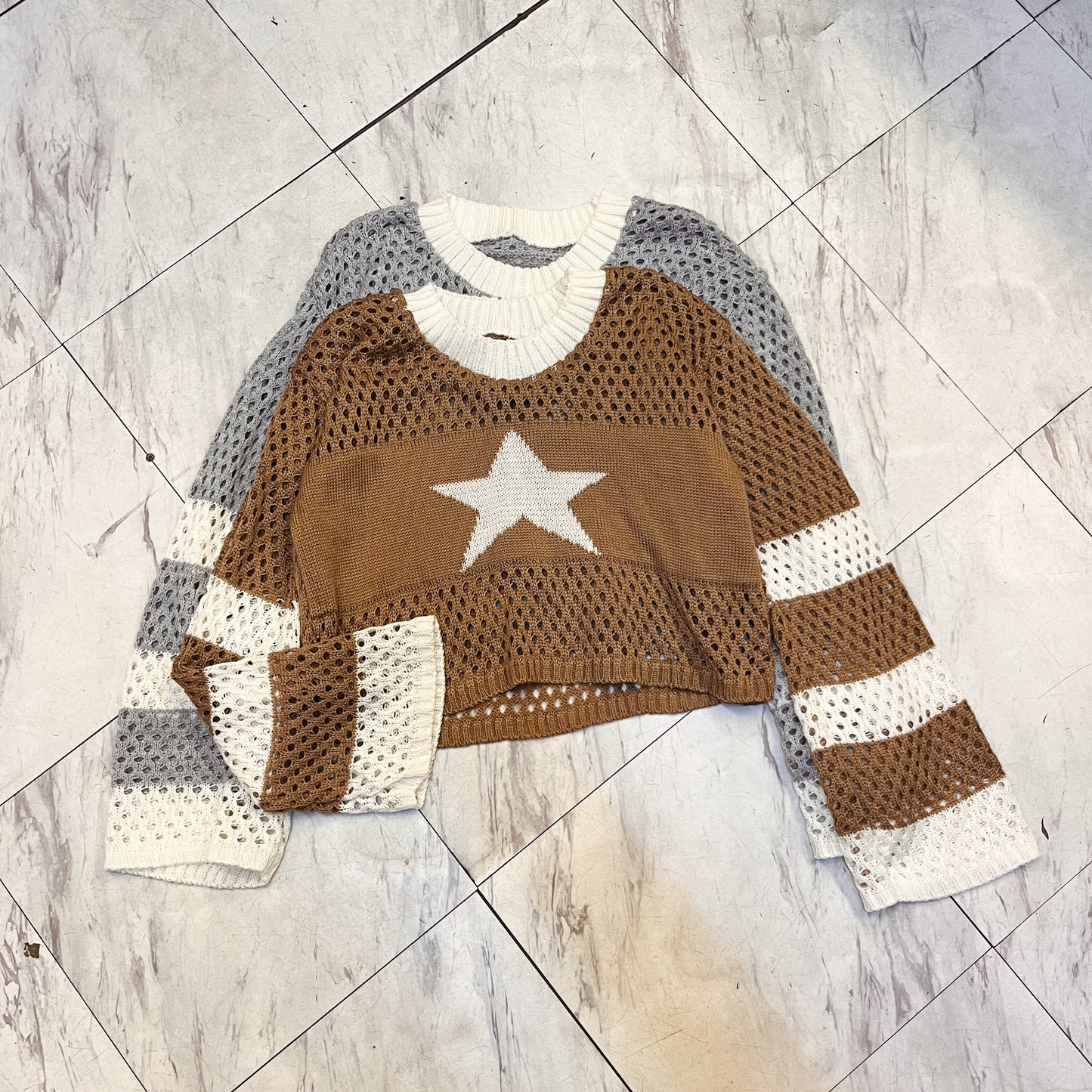 Suéter tejido estrella