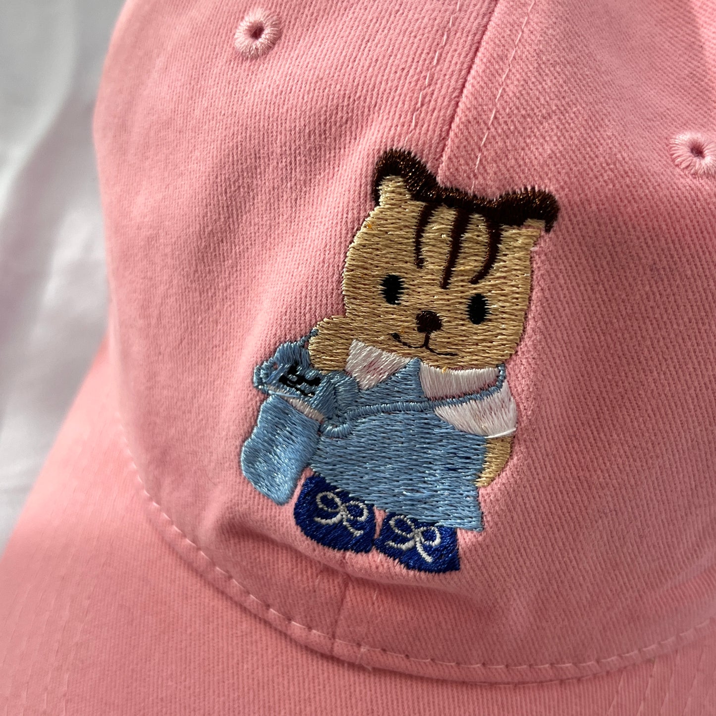 Gorra ternurin azul rosa